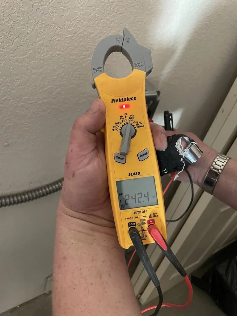 Voltage testing with clamp meter during Aluminum Wiring Replacement in Henderson